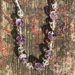 Amethyst beads with crystals.
